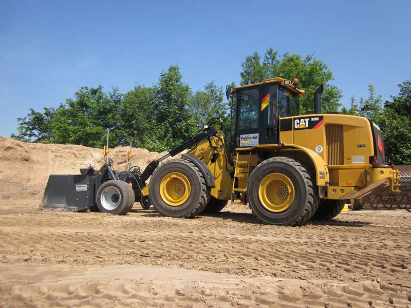 Mekos grader in actie